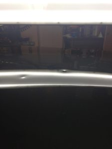 Photo of car with hail damage